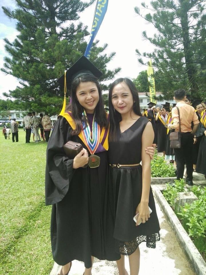 Student graduation made possible through education support from Shining Light Ministry